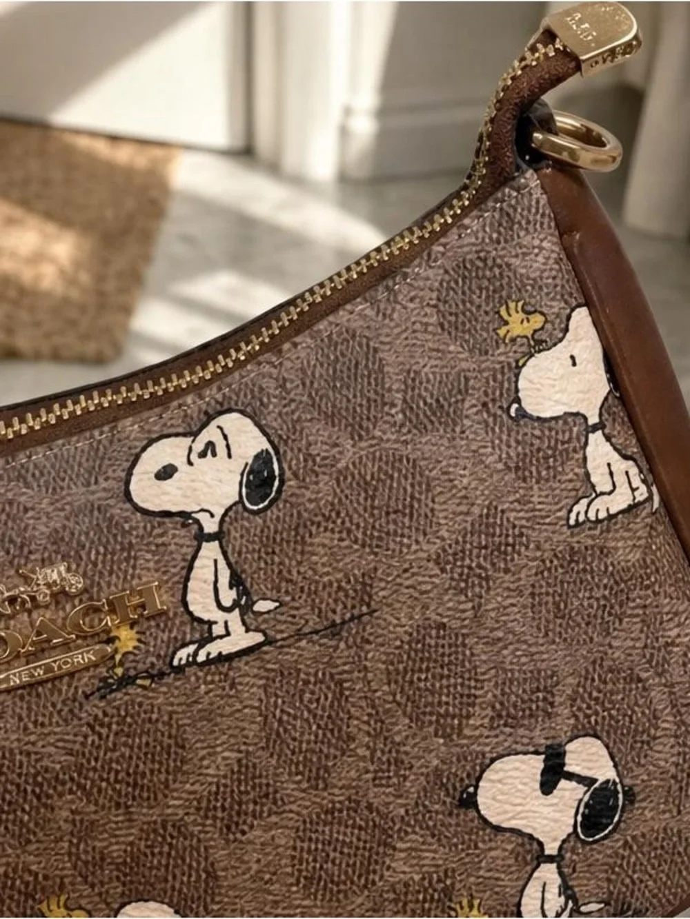 Coach Brown Snoopy Printed Wristlet with Gold Hardware